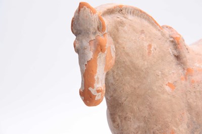 Lot 150 - A TANG DYNASTY PAINTED POTTERY HORSE (618 -...