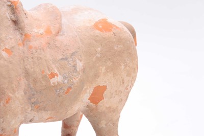 Lot 150 - A TANG DYNASTY PAINTED POTTERY HORSE (618 -...