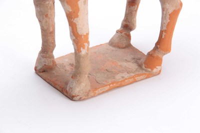 Lot 150 - A TANG DYNASTY PAINTED POTTERY HORSE (618 -...