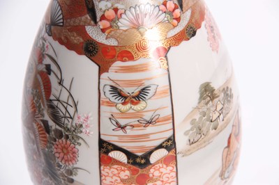 Lot 155 - A JAPANESE KUTANI WARE OVOID BOTTLE VASE with...