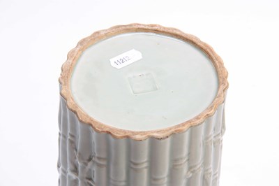 Lot 180 - A CHINESE CYLINDRICAL CELEDON VASE decorated...