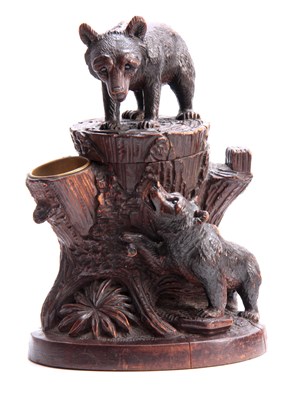 Lot 378 - A LATE 19TH CENTURY SWISS CARVED BEAR TOBACCO...
