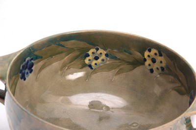 Lot 39 - A WILLIAM MOORCROFT BURSLEM FOOTED TWO-HANDLED...