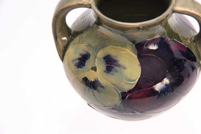 Lot 40 - A WILLIAM MOORCROFT BURSLEM CELADON GROUND...
