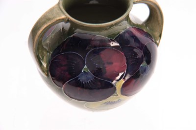 Lot 40 - A WILLIAM MOORCROFT BURSLEM CELADON GROUND...