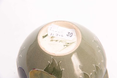 Lot 40 - A WILLIAM MOORCROFT BURSLEM CELADON GROUND...