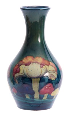 Lot 52 - A MOORCROFT CLAREMONT BALUSTER VASE the body...