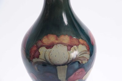 Lot 52 - A MOORCROFT CLAREMONT BALUSTER VASE the body...