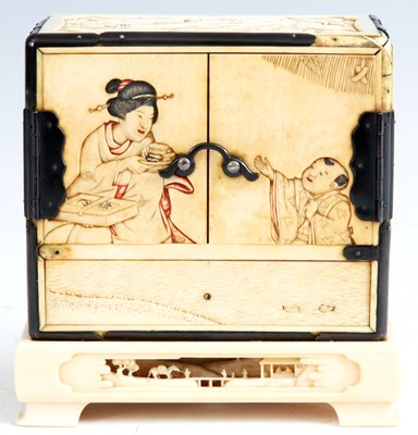 Lot 161 - A 19th CENTURY MINIATURE IVORY CABINET ON...