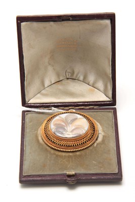 Lot 668 - A LATE VICTORIAN 15CT YELLOW GOLD OVAL...