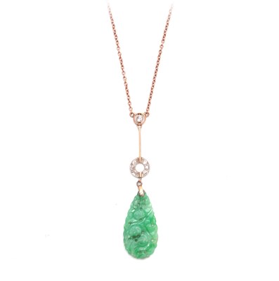 Lot 750 - A JADE PENDANT with carved and pierced...