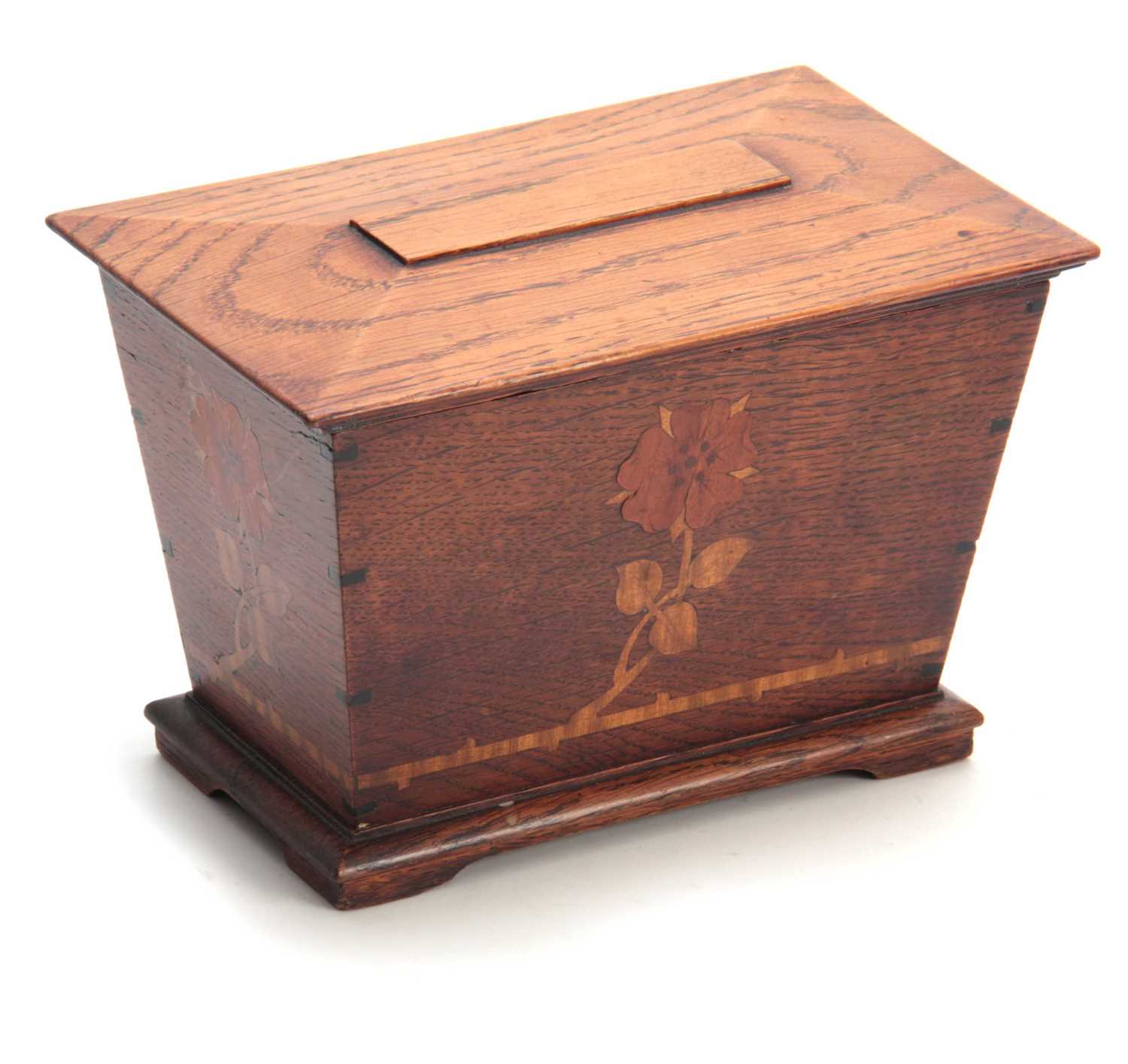 Lot 953 - AN ARTS AND CRAFT INLAID OAK TEA CADDY of...