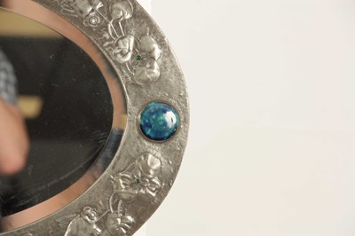 Lot 960 - A LATE 19th CENTURY LIBERTY PEWTER OVAL MIRROR...