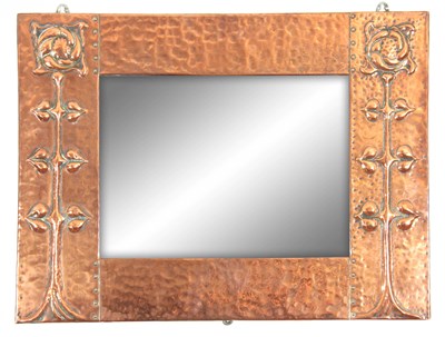Lot 961 - AN ARET NOVEAU HAMMERED COPPER HANGING MIRROR...