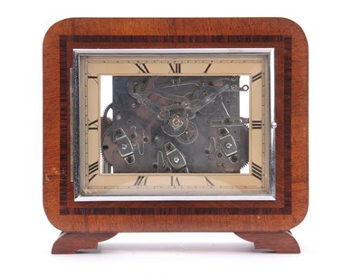 Lot 1106 - AN UNUSUAL ART DECO WALNUT QUARTER CHIMING...