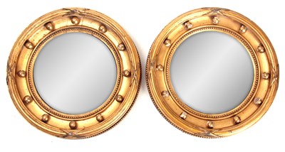 Lot 1123 - A PAIR OF SMALL REGENCY GILT GESSO CARVED...