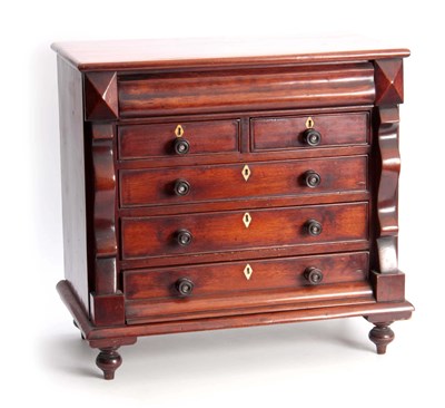 Lot 1133 - A 19TH CENTURY MAHOGANY MINIATURE CHEST OF...