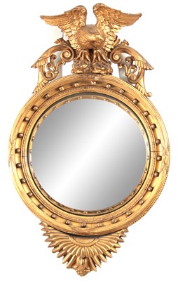 Lot 1147 - AN IMPRESSIVE REGENCY CONVEX CARVED GILT GESSO...