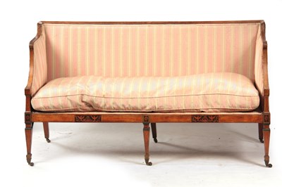 Lot 1150 - A REGENCY SATINWOOD THREE SEATER SETTEE with...