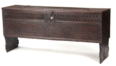 Lot 1177 - A 17TH CENTURY OAK PLANK COFFER / SWORD BOX OF...
