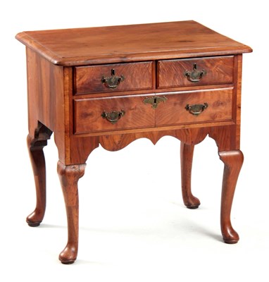 Lot 1198 - AN 18TH CENTURY FIGURED WALNUT LOWBOY with...