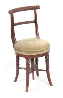 Lot 1223 - AN EARLY 19TH CENTURY MAHOGANY MUSIC CHAIR...