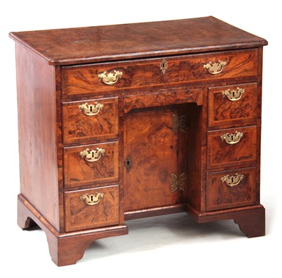 Lot 1227 - A GEORGE I HERRING-BANDED BURR WALNUT KNEEHOLE...