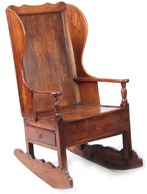 Lot 1236 - AN 18th CENTURY ELM LAMBING CHAIR with shaped...