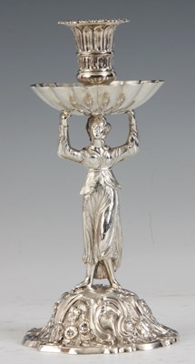 Lot 284 - A WILLIAM IV CAST SILVER HARLEQUIN TAPER STICK...