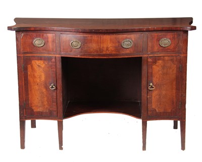 Lot 1255 - A GEORGE III SERPENTINE FRONTED DRESSING CHEST...