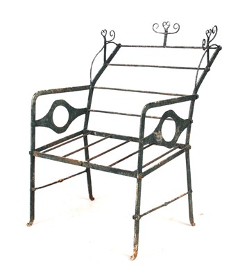 Lot 1273 - A REGENCY CAST IRON BENCH having a reclining...