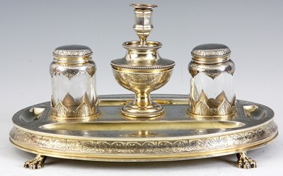 Lot 299 - A VICTORIAN SILVER GILT INKSTAND the oval...