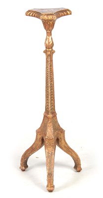 Lot 1330 - A GEORGE II CARVED GILT GESSO TORCHERE IN THE...
