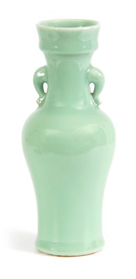 Lot 137 - A CHINESE CELEDON BULBOUS VASE with moulded...