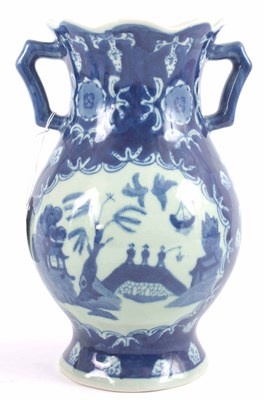 Lot 154 - A CHINESE BLUE AND WHITE BULBOUS VASE 24cm high.
