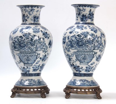 Lot 157 - A PAIR OF ORIENTAL BLUE AND WHITE BALUSTER...
