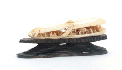 Lot 184 - A CHINESE CANTON IVORY SCULPTURE modelled as...