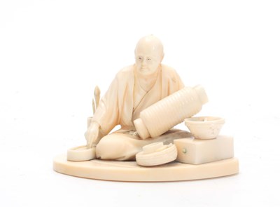 Lot 195 - A MEIJI PERIOD JAPANESE IVORY OKIMONO modeled...