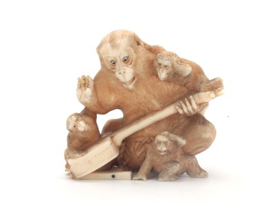 Lot 198 - A MEIJI PERIOD JAPANESE IVORY OKIMONO modelled...