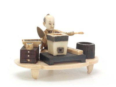Lot 199 - A JAPANESE MEIJI PERIOD IVORY AND STAINED...