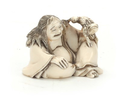 Lot 204 - A MEIJI PERIOD JAPANESE IVORY NETSUKE modelled...