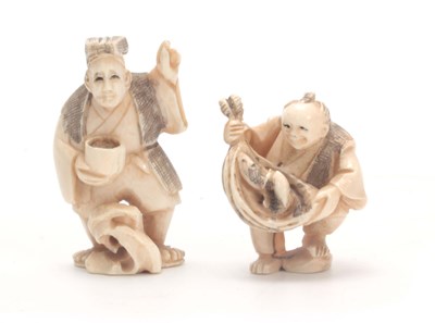 Lot 207 - A PAIR OF JAPANESE IVORY NETSUKE one modelled...