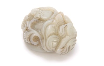 Lot 210 - A CHINESE CARVED JADE SCULPTURE depicting a...