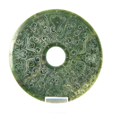 Lot 211 - A CHINESE SHALLOW CARVED SPINACH JADE PI...