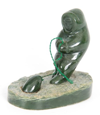 Lot 215 - A 20TH CENTURY JADE INDUIT SCULTURE depicting...