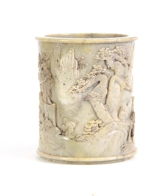 Lot 218 - A 19TH CENTURY CHINESE PALE GREEN SOAPSTONE...