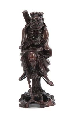 Lot 277 - A 19TH CENTURY CHINESE HARDWOOD STANDING...