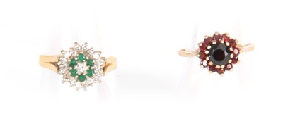Lot 329 - A 14CT GOLD EMERALD AND DIAMOND CLUSTER RING...