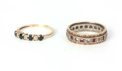 Lot 339 - A LADIES 9CT GOLD RUBY AND DIAMOND SET...