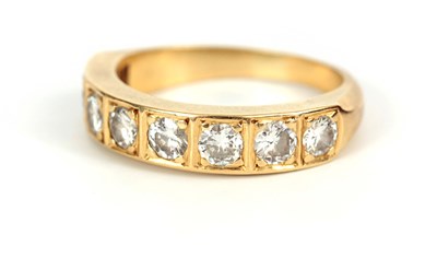 Lot 353 - AN 18CT YELLOW GOLD AND DIAMOND ETERNITY RING...